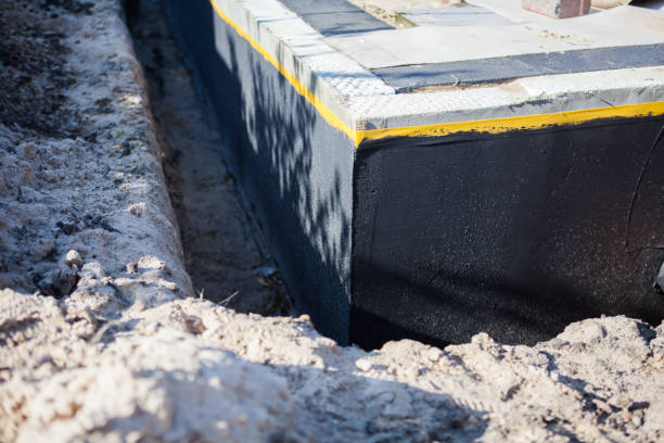 Professional Emergency Waterproofing technician working in Fairless Hills, PA